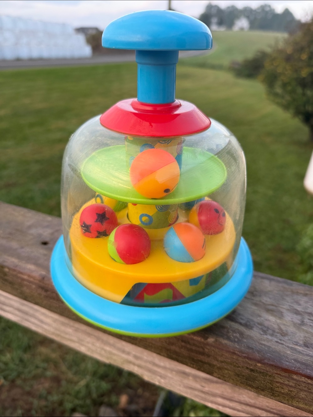 Colorful Pop-Up Spinning Learning Toy - Blue, Yellow, Red, Green